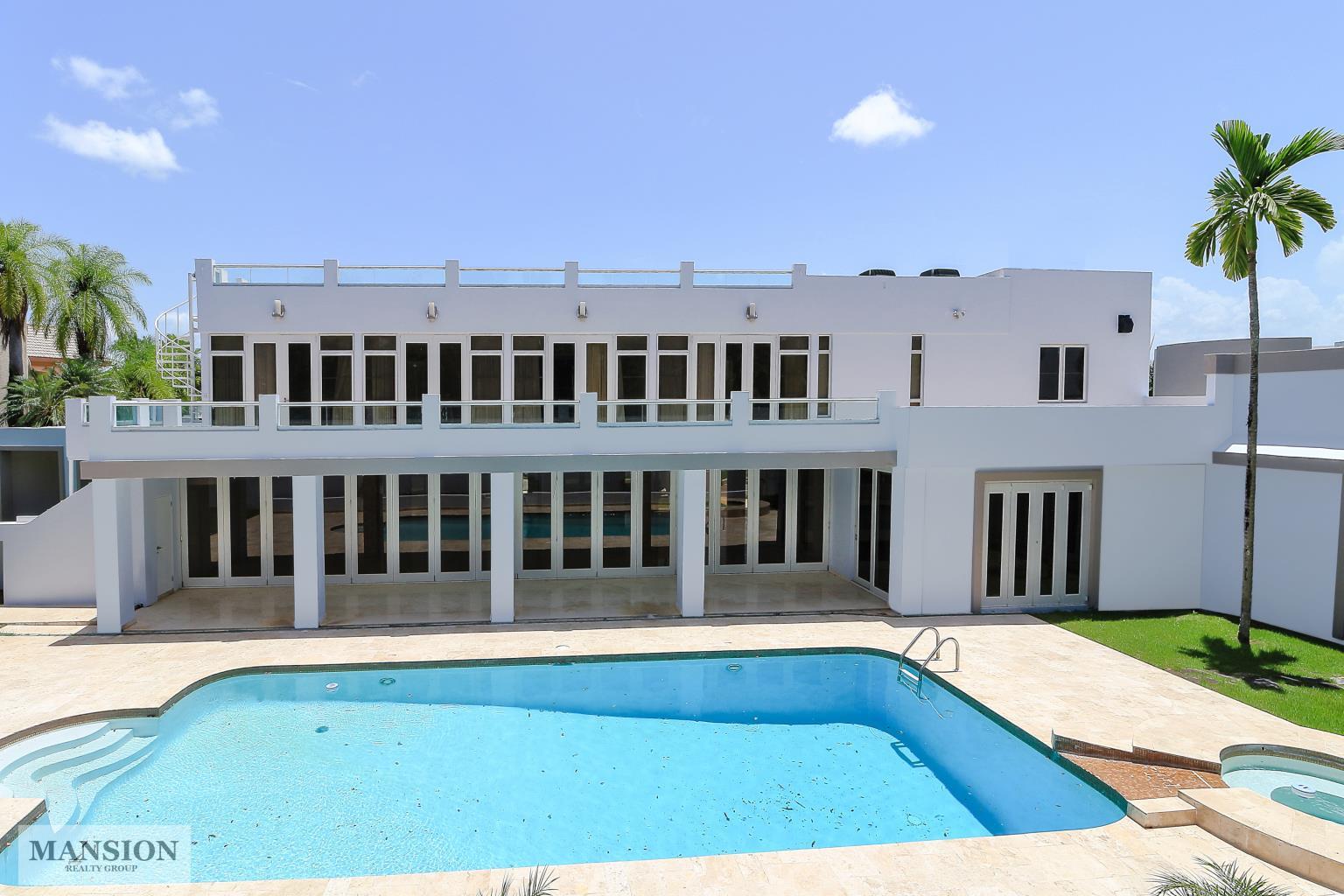 Modern Enchantment at La Villa de Torrimar Mansion Realty Group