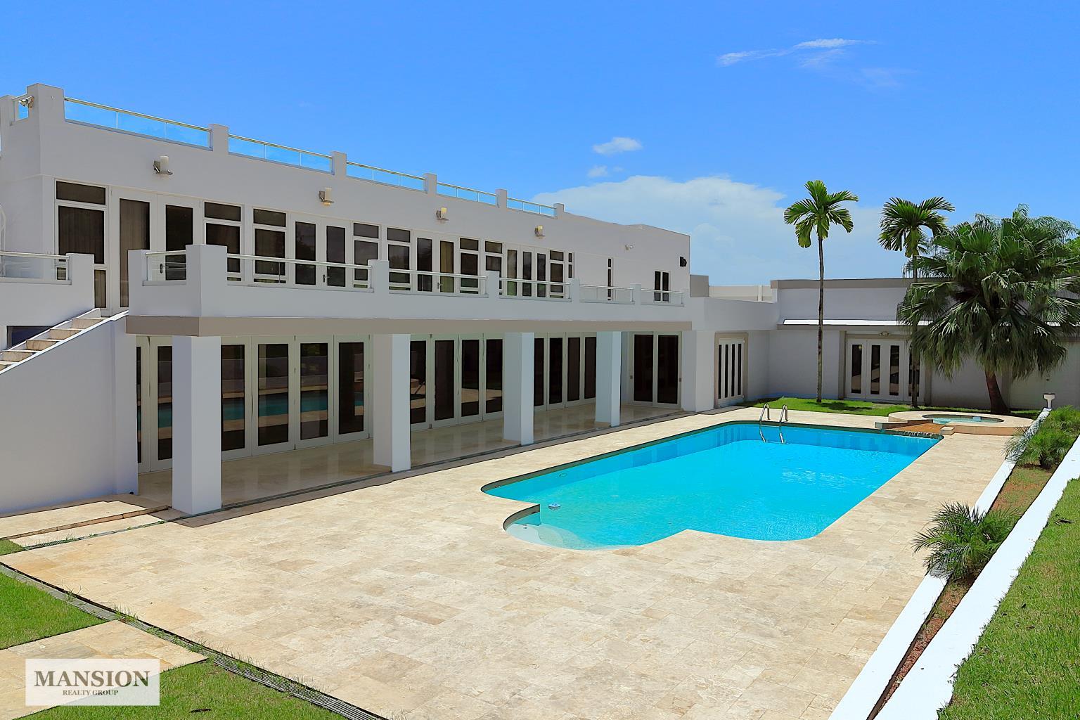 Modern Enchantment at La Villa de Torrimar Mansion Realty Group