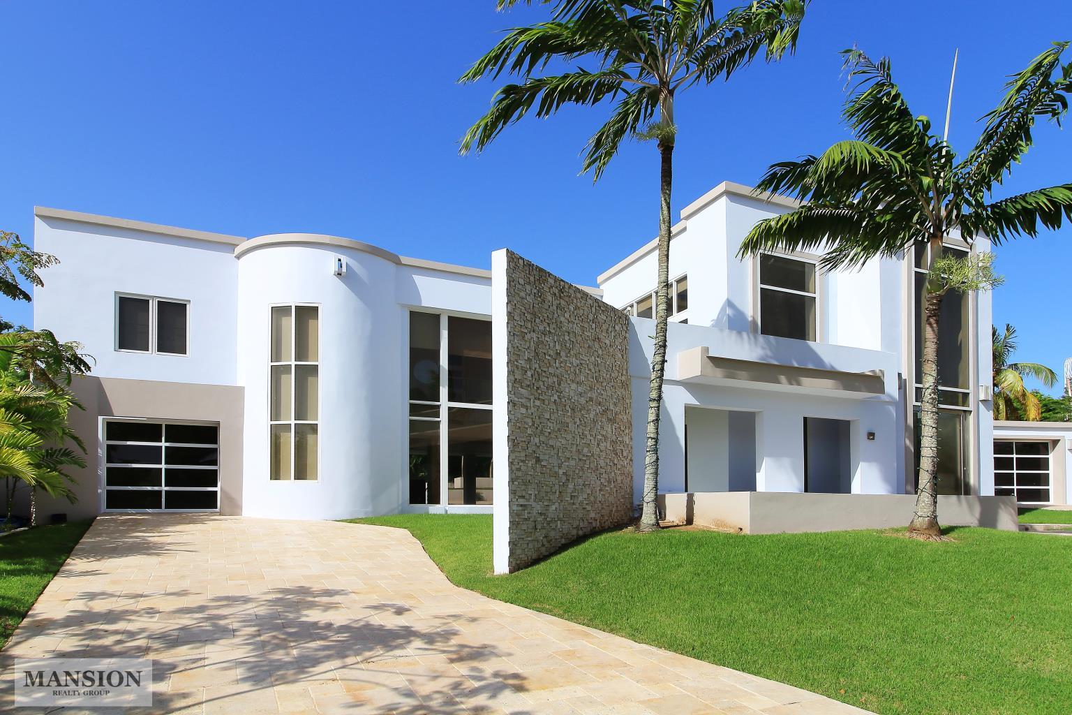 Modern Enchantment at La Villa de Torrimar Mansion Realty Group