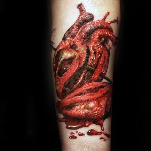 40 gebrochenes Herz Tattoo Designs für Männer Split Ink Ideen Mann