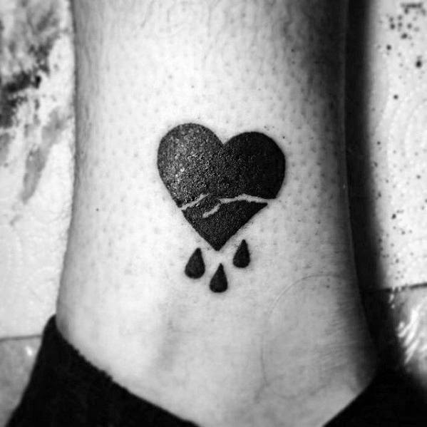40 gebrochenes Herz Tattoo Designs für Männer Split Ink Ideen Mann