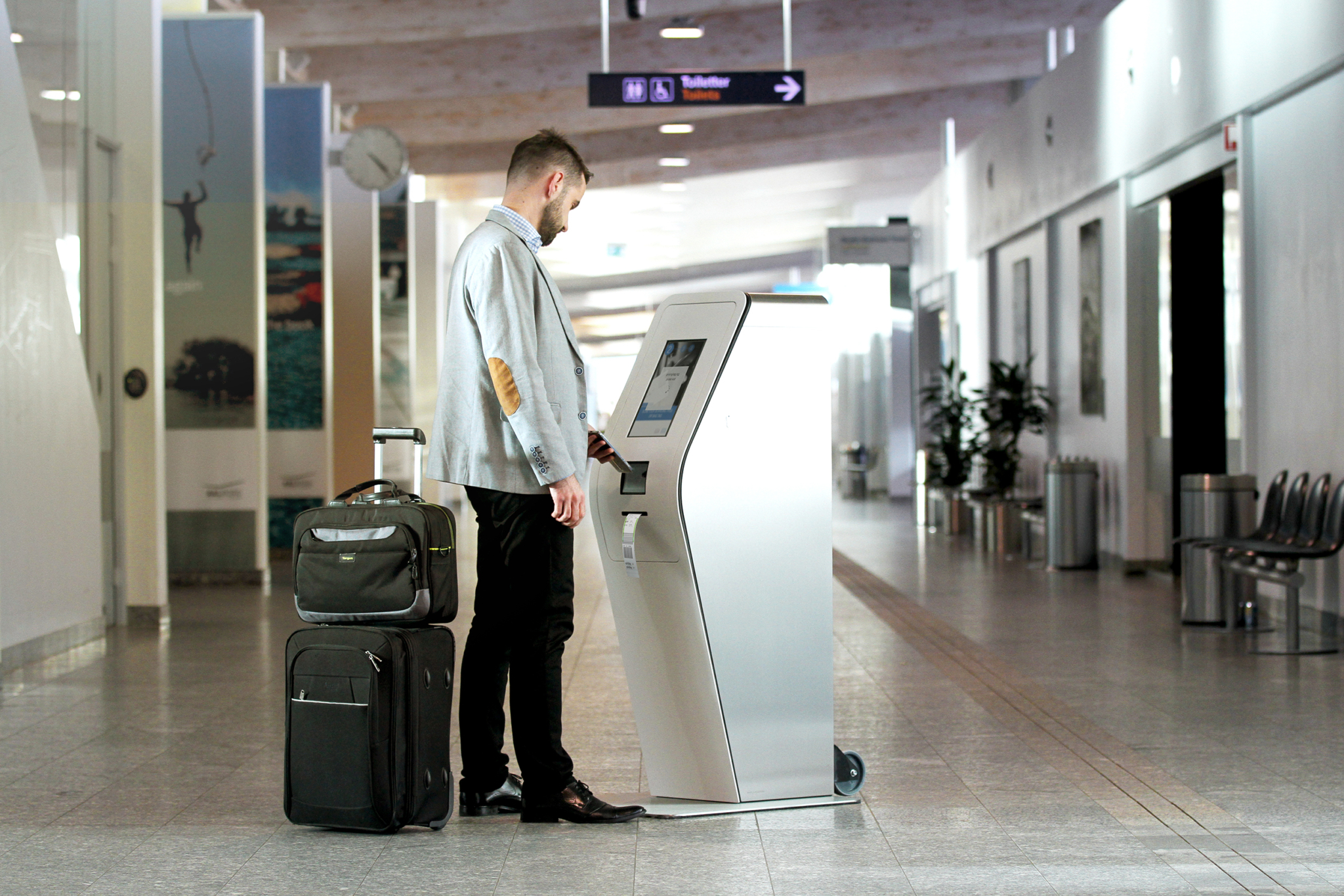 Tag.Go bag tag kiosk Marcus Pedersen Airport Interior Solutions