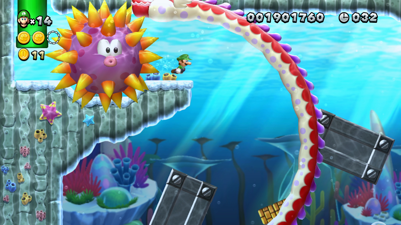 Just after collecting the first Star Coin, swim over to the left and