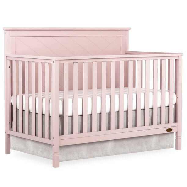 14 Solid Back Crib Options For a Nursery