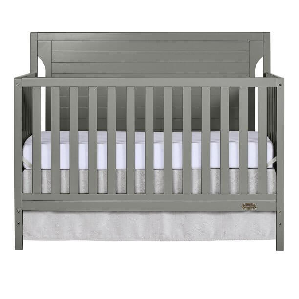 14 Solid Back Crib Options For a Nursery