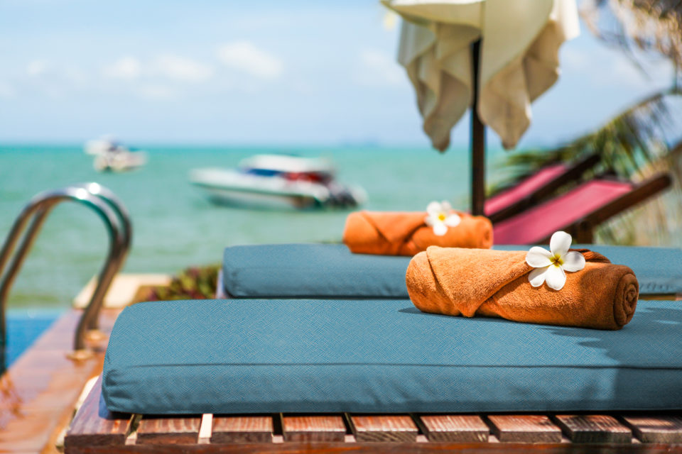 Sun beds at the pool MaterialDistrict