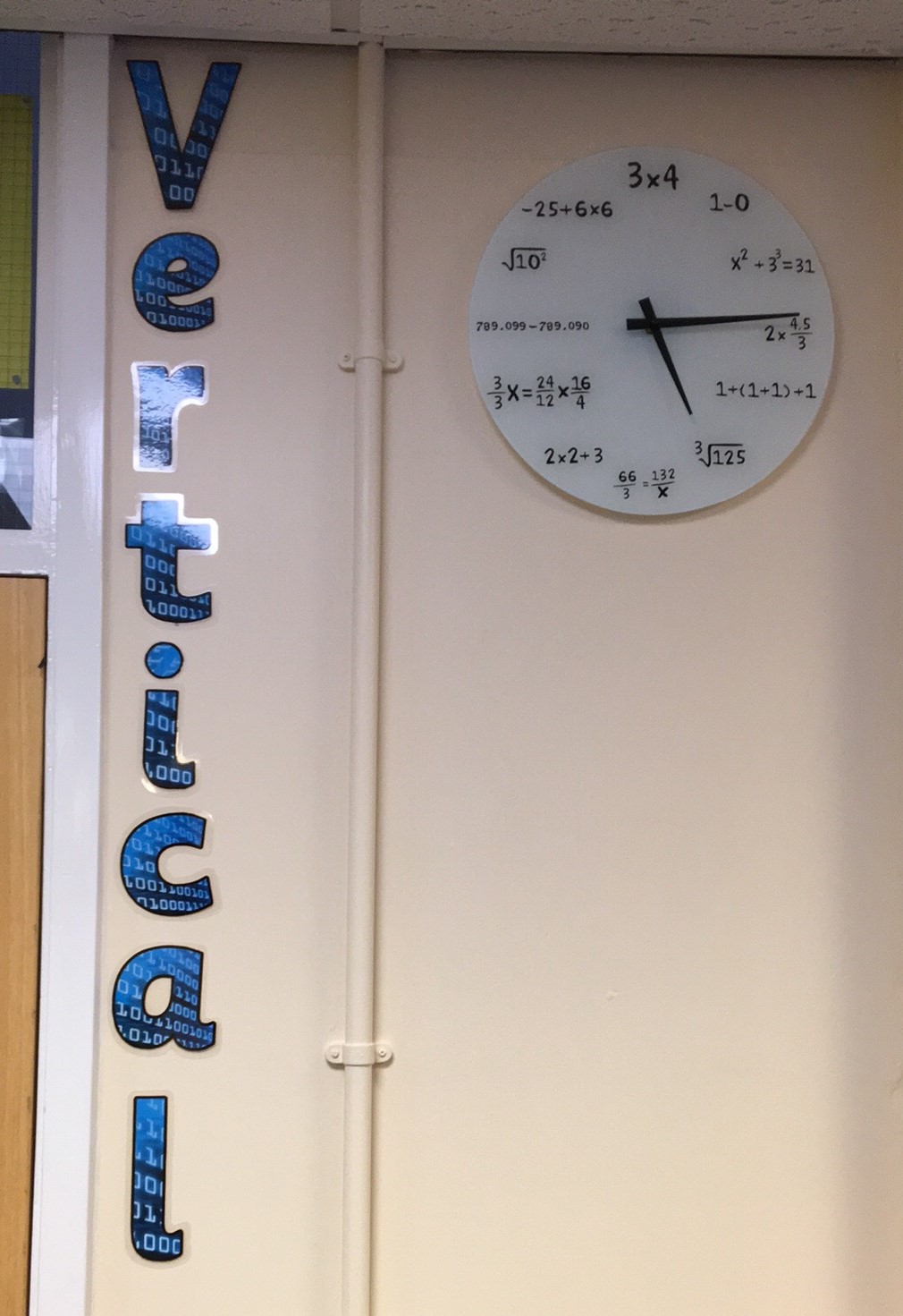 vertical and maths clock Maths Whizz Kid
