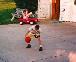 Perfecting the art of the crossover dribble as a youngster.