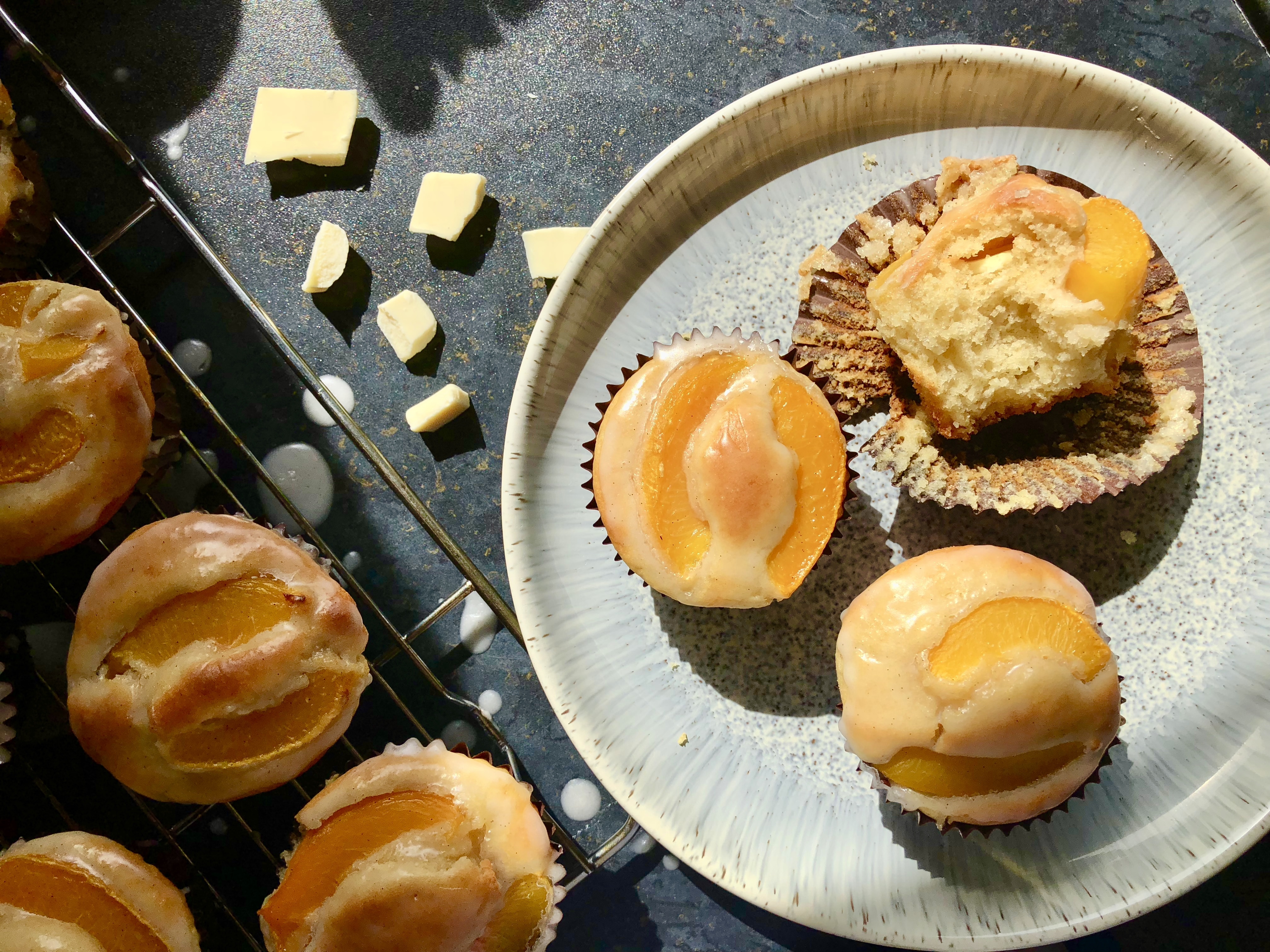 Peach and White Chocolate Muffins with Vanilla Glaze Maverick Baking