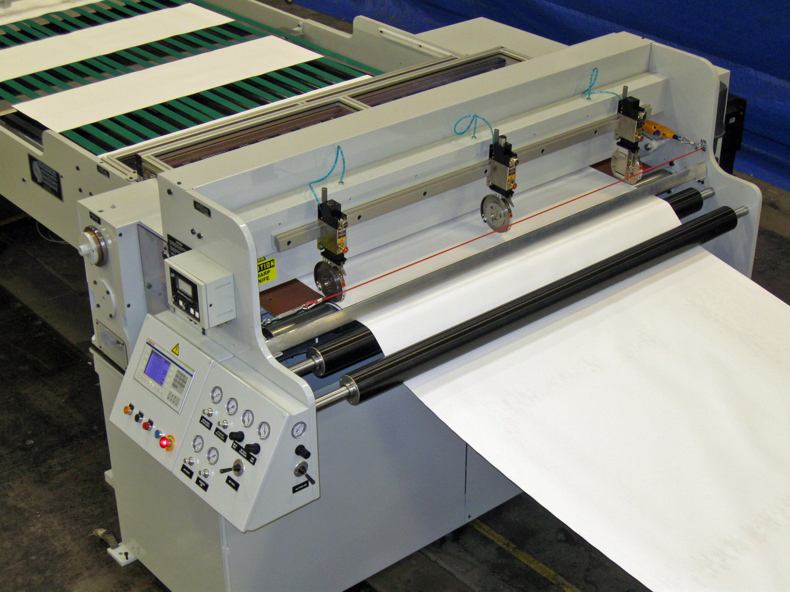 SHEETER, COATED PLASTIC FILM