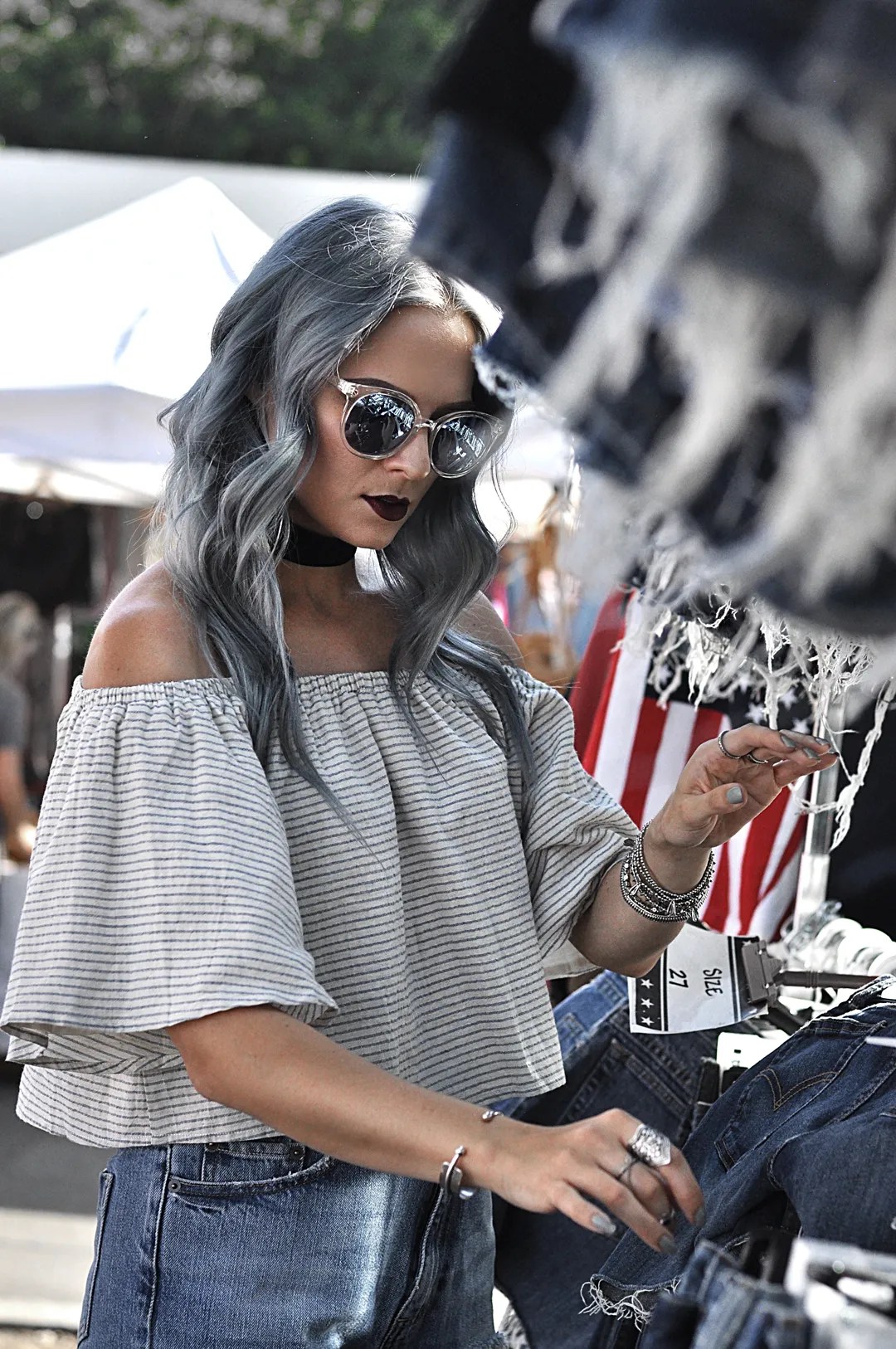 A cute off the shoulder crop top with ripped denim and sandals makes for the perfect casual style for a day in the city. I'm in love with this outfit!