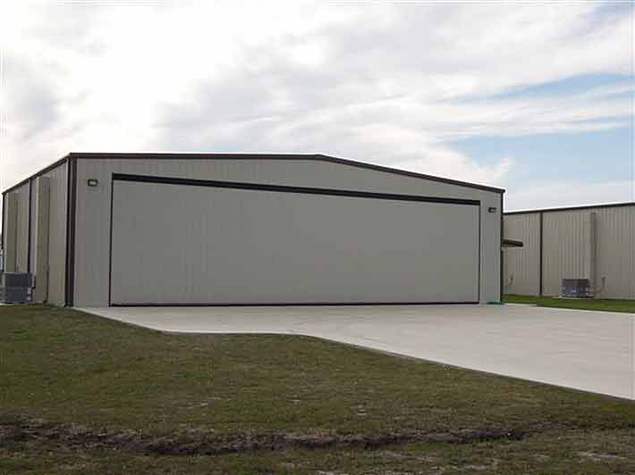 No. 20 Aircraft Hanger McDougal and Moore Real Estate Brokerage