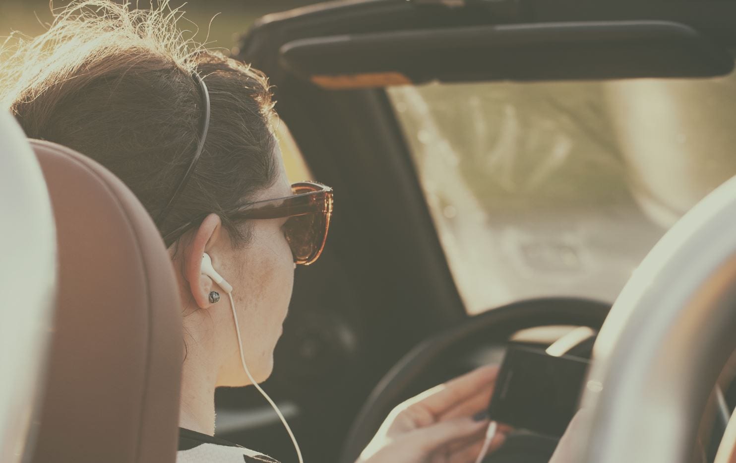 Can I use headphones when driving? Mcintyre Thanasides