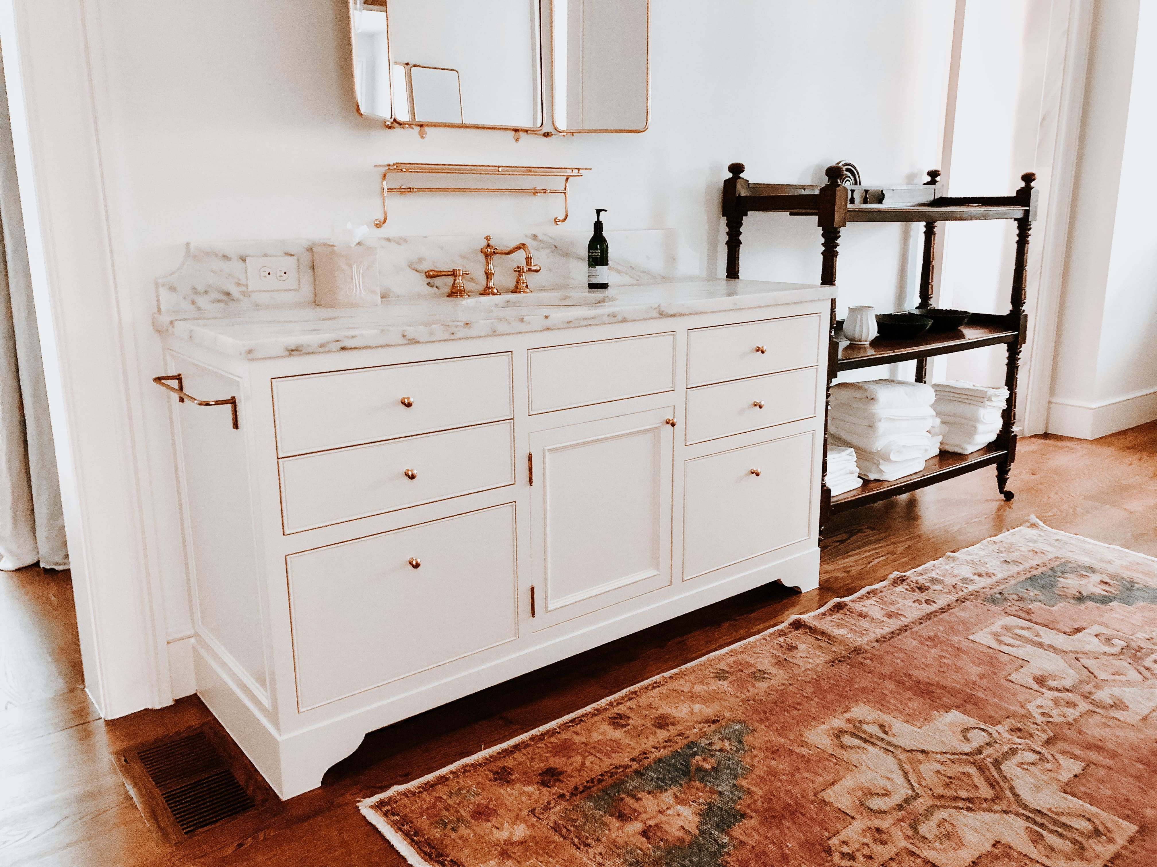 White Bathroom Vanity with Brass MDM Design Studio