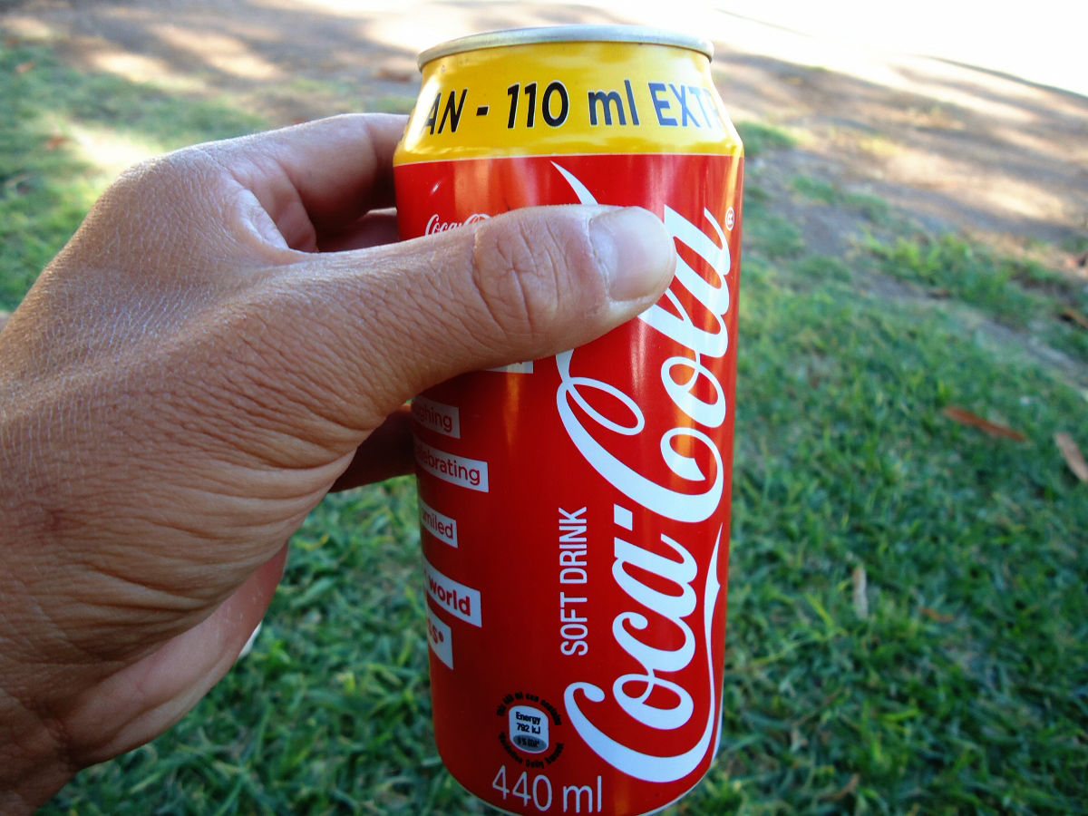 How big is a coke can in cm? Find out the answer on this page