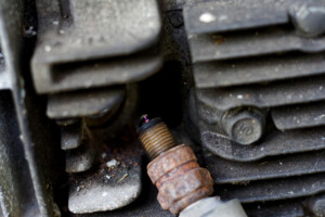 7 Symptoms Of Bad Spark Plugs & Replacement Cost