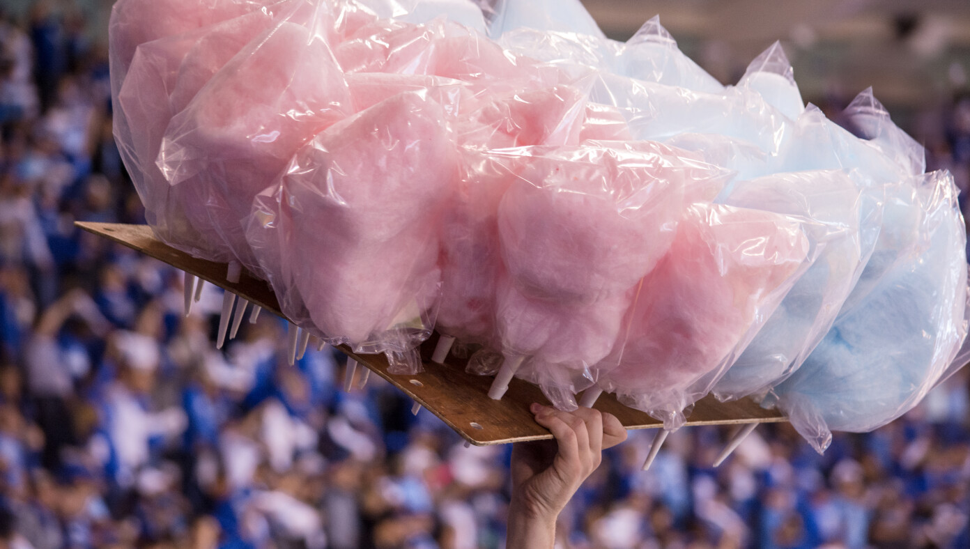 Cotton Candy Vendor Patiently Waits For Most Important Play Of Game To