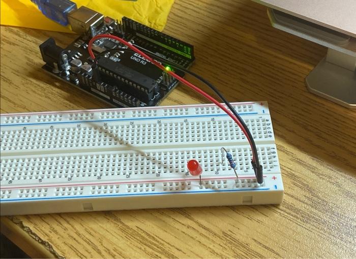 Solved why is my led not lighting up. what am i doing wrong?