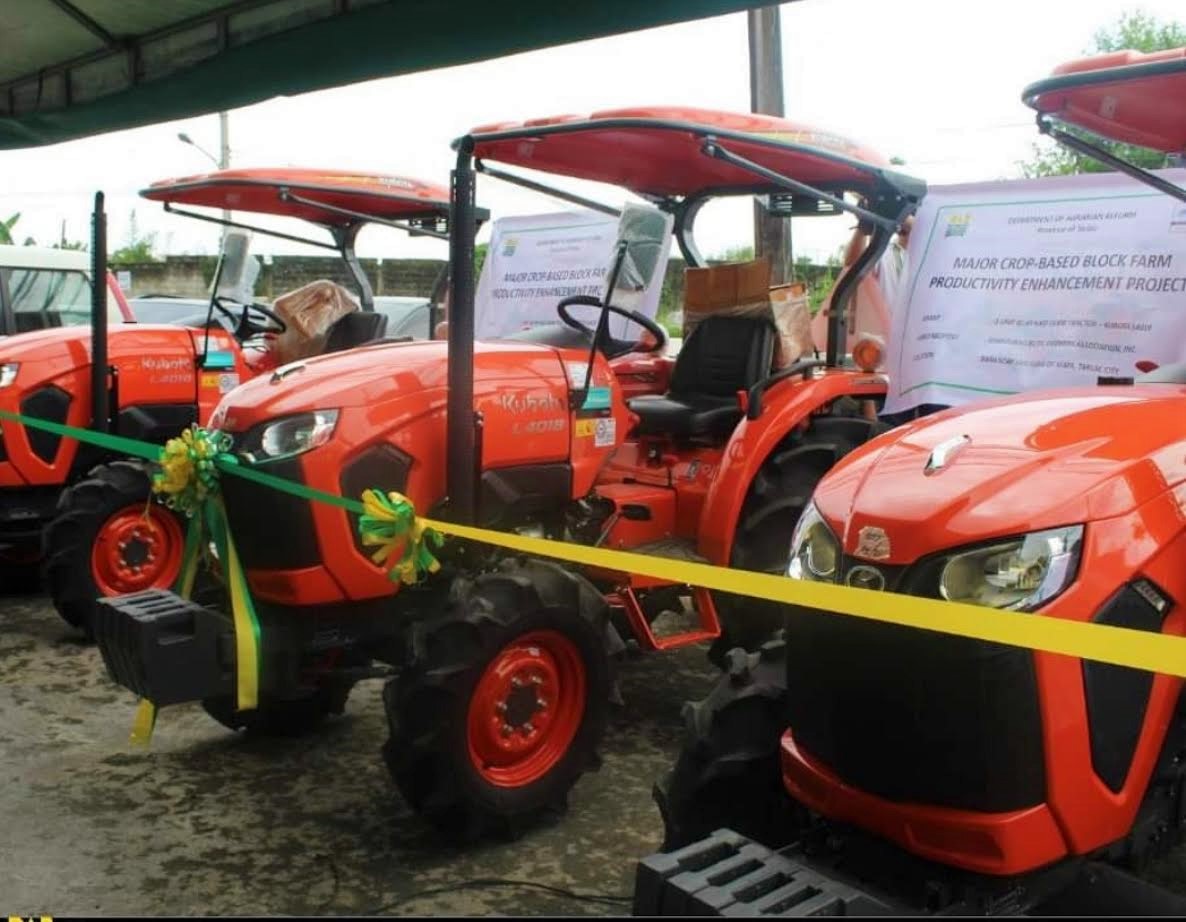 DAR turns over P2.9 million worth of farm tractors to Tarlac farmers