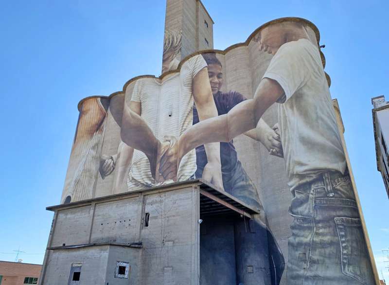 Event celebrates completion of huge mural in downtown Salina