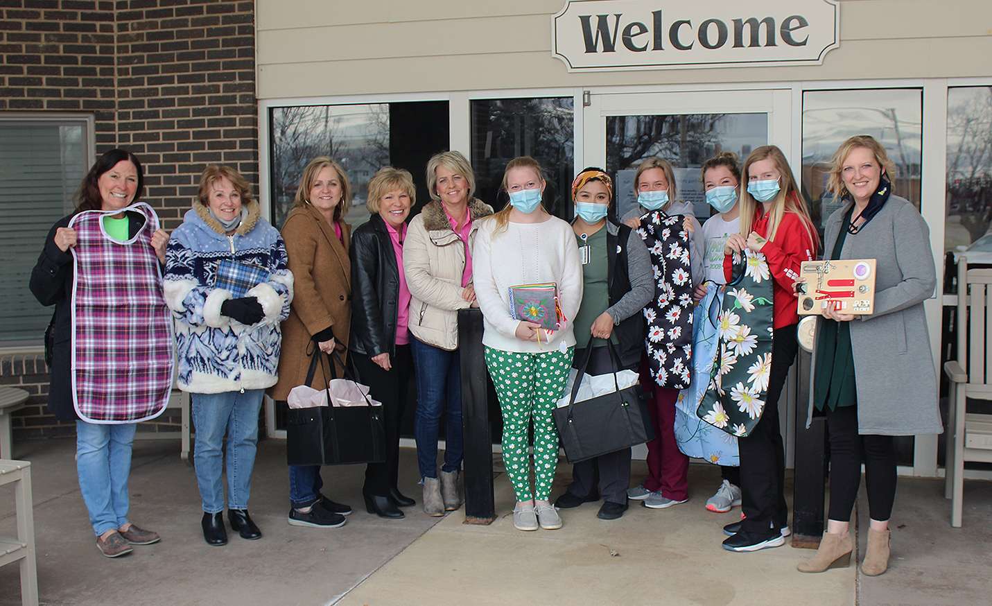 Wonder Women League presents items to longterm care homes