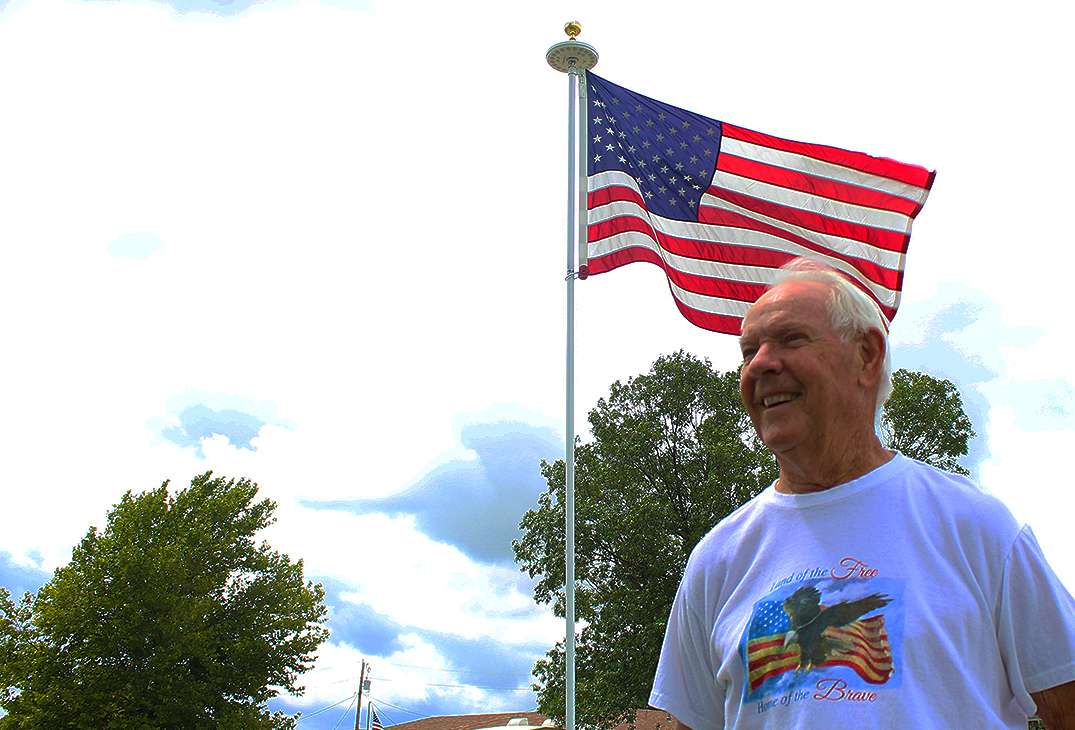 Hays vet builds flag poles to share love of country with neighbors