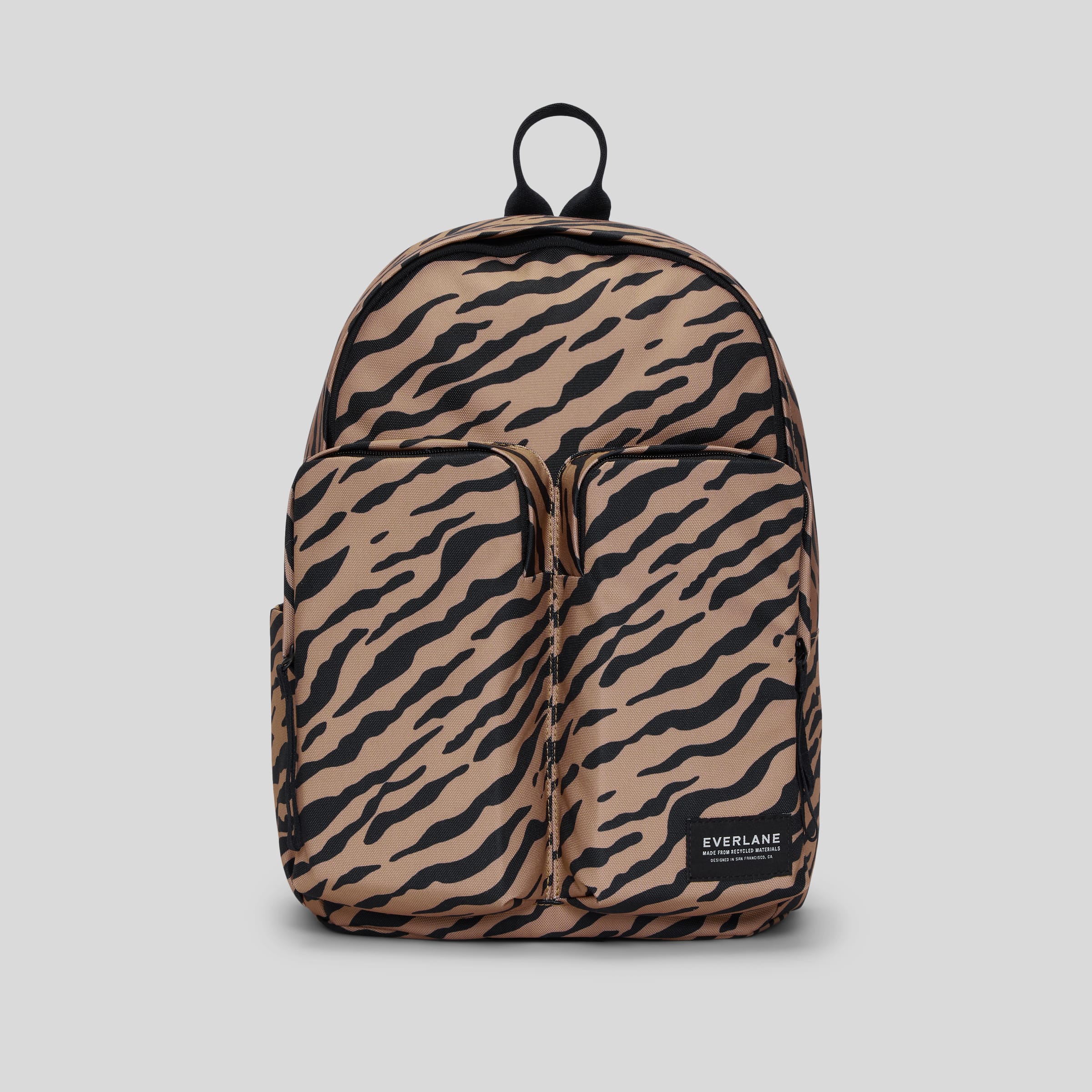 The ReNew Transit Utility Backpack Tiger Stripe Toasted Coconut Everlane