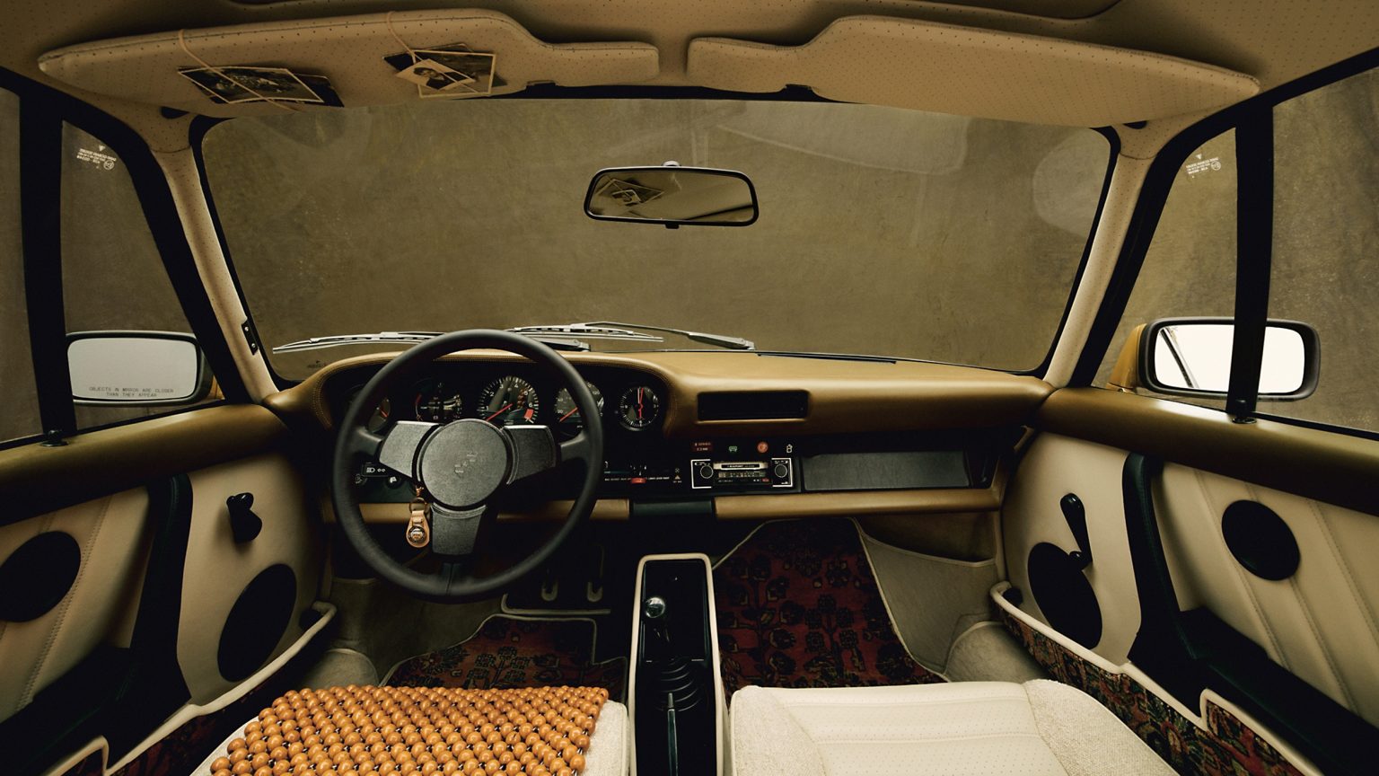 This couture Porsche 911 has Persian carpets and a bead mat seat