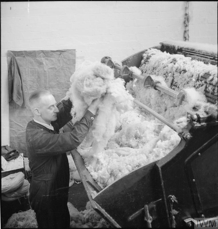 OLD RAGS INTO NEW CLOTH SALVAGE IN BRITAIN, APRIL 1942 Imperial War Museums