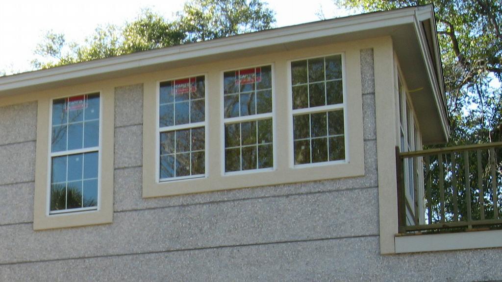 Detail of Tabby Stucco with Custom Color Bands from S & S Stucco & Fine
