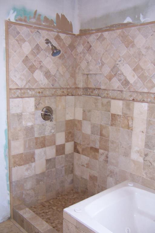 Tumbled Travertine Shower from Great American Tile and Construction LLC