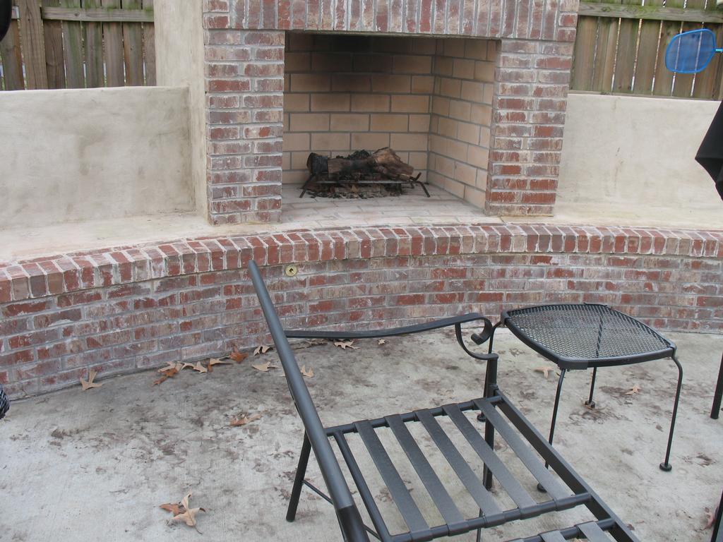Custom stucco/brick outdoor fireplace from jackpot construction in