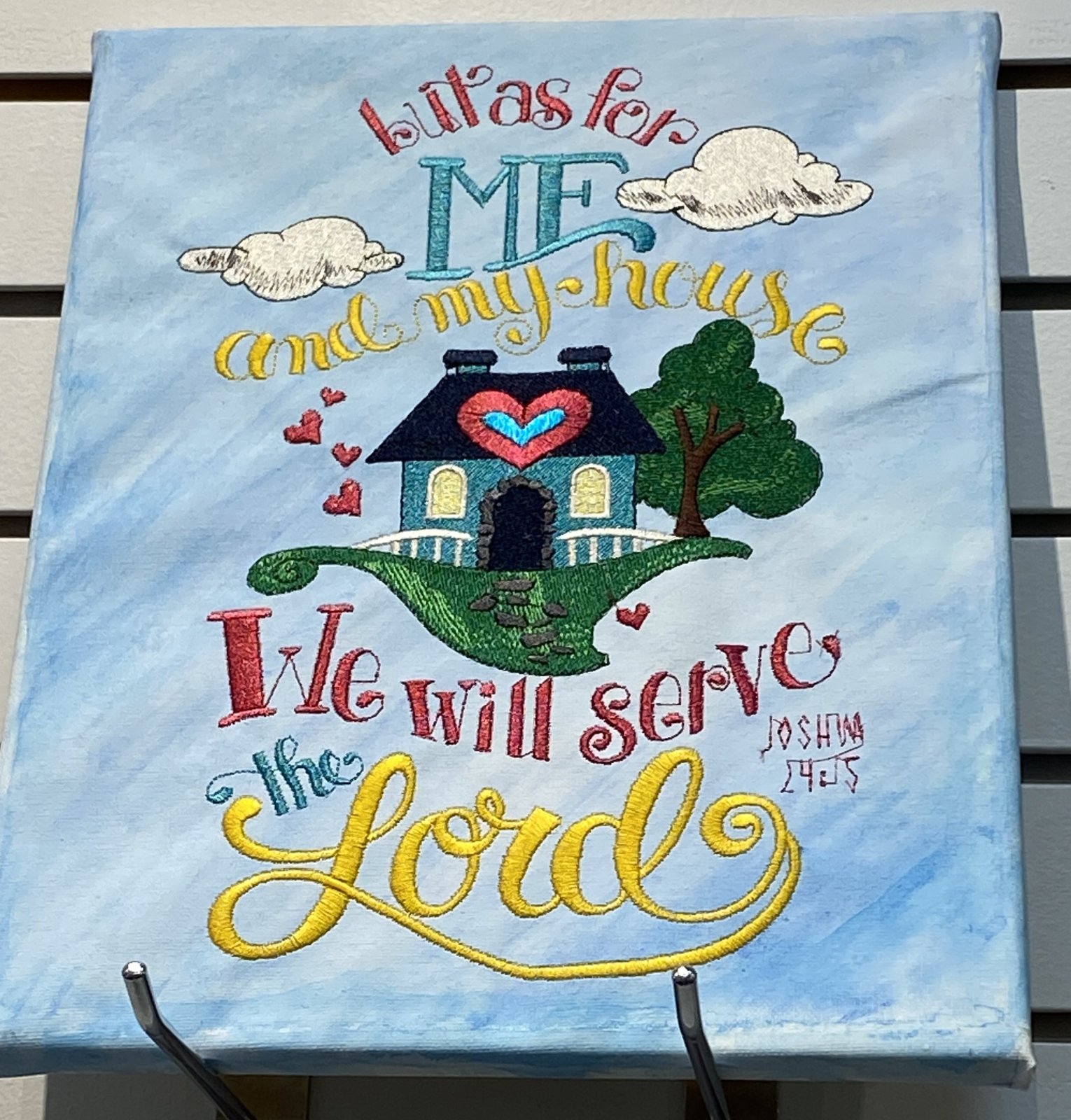 Embroidery on painted canvas