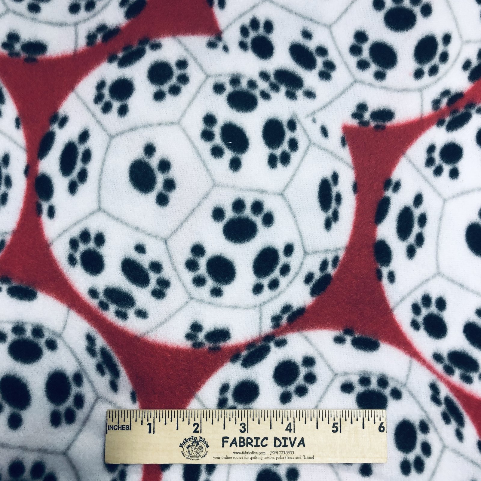 Dog Paw Print on Red Soccer Balls Fleece Fabric