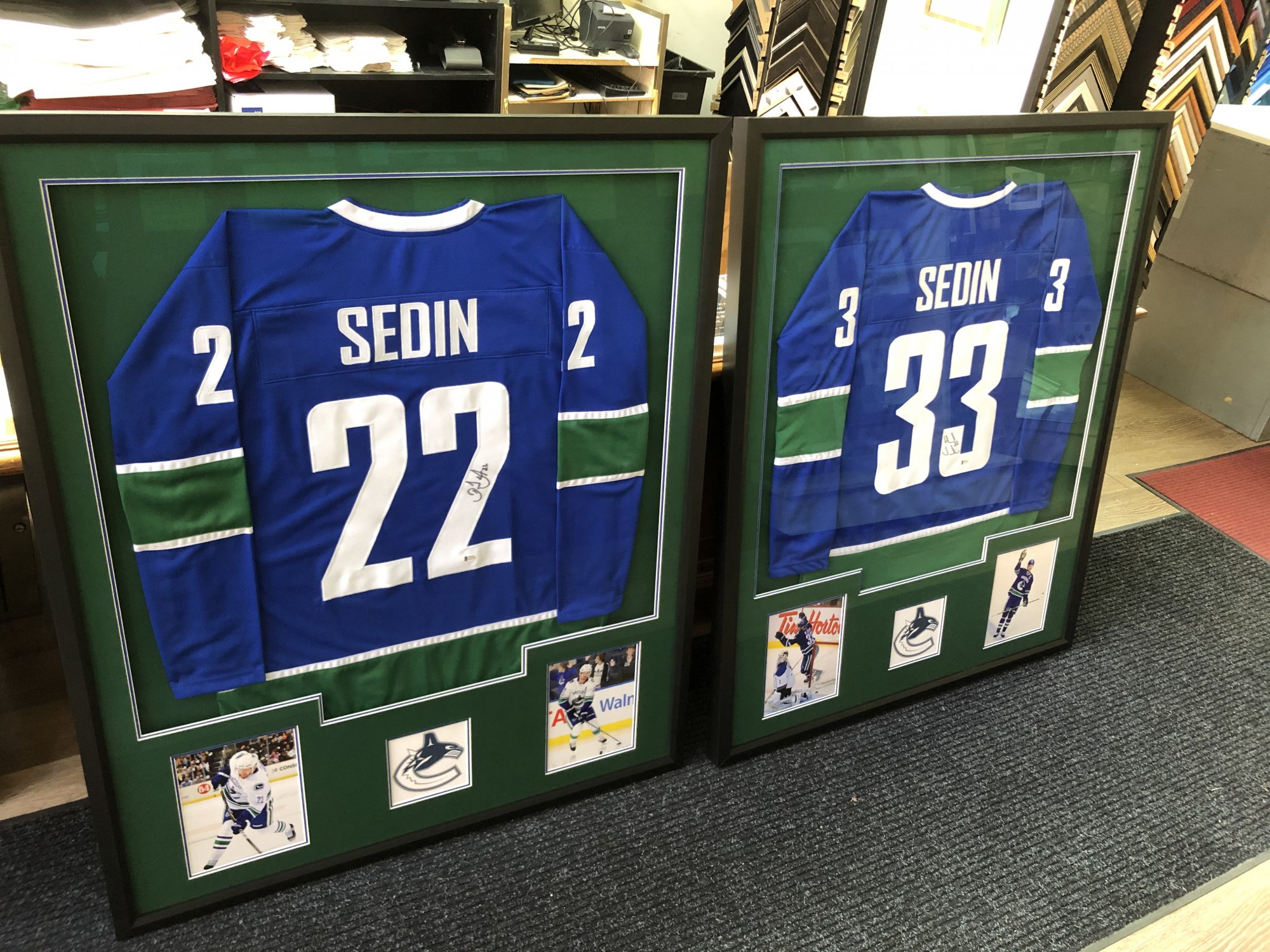 Two Vancouver Cannucks Hockey Jerseys Autographed by The Sedin Twins