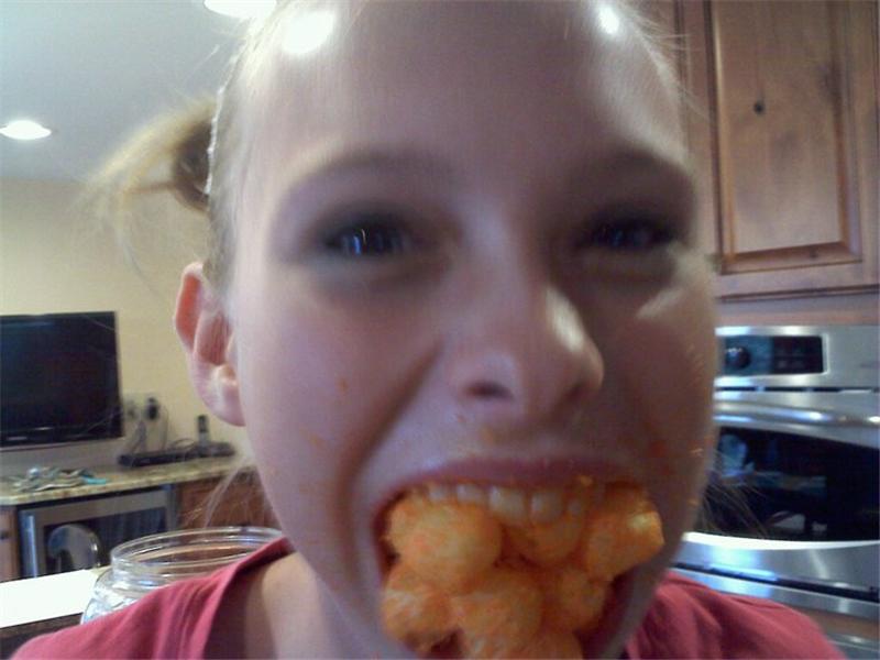 Most Cheese Balls Fit In Open Mouth World Record Emily Roberts