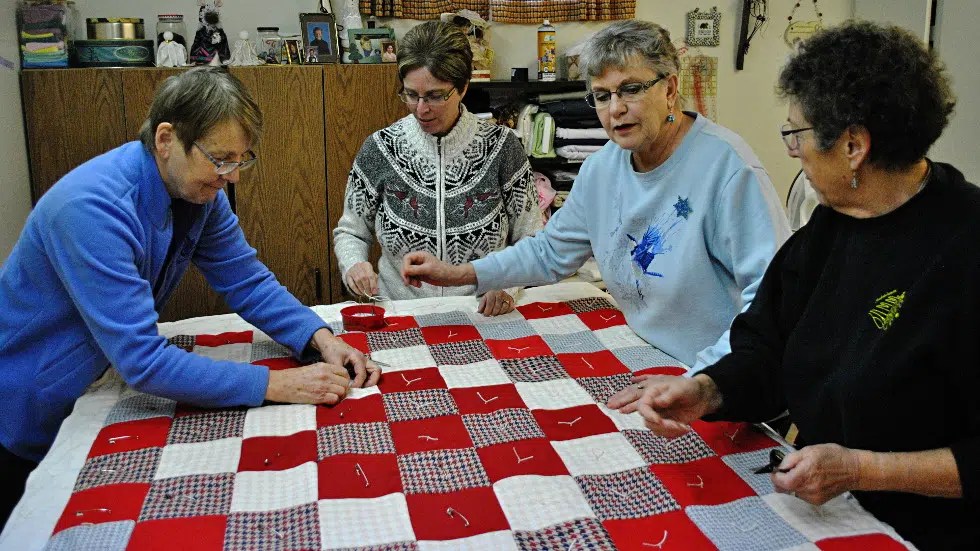 P.A. sewing group donates quilts to women’s shelter paNOW