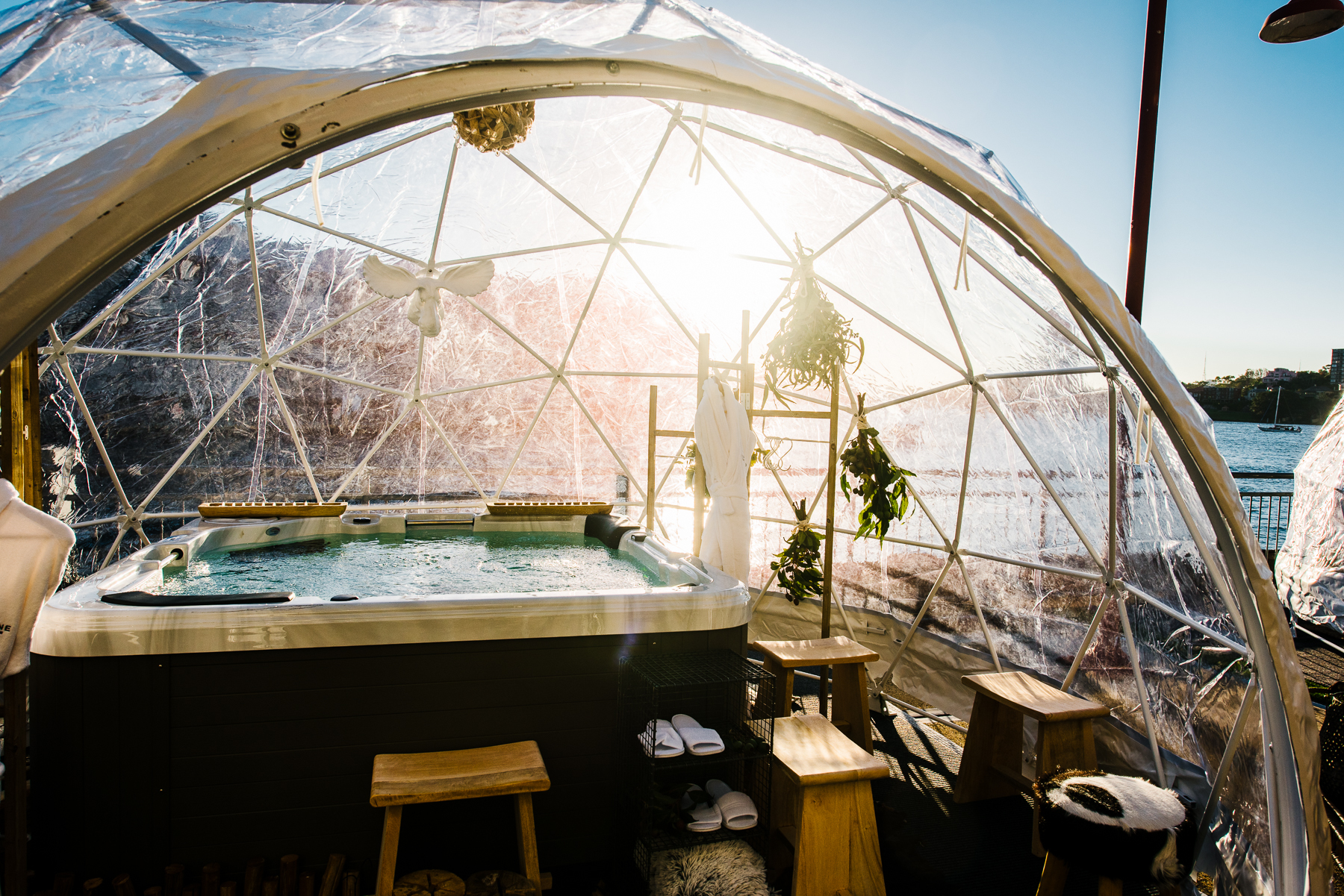 You can now sit in a hot tub and sip wine in a waterfront igloo