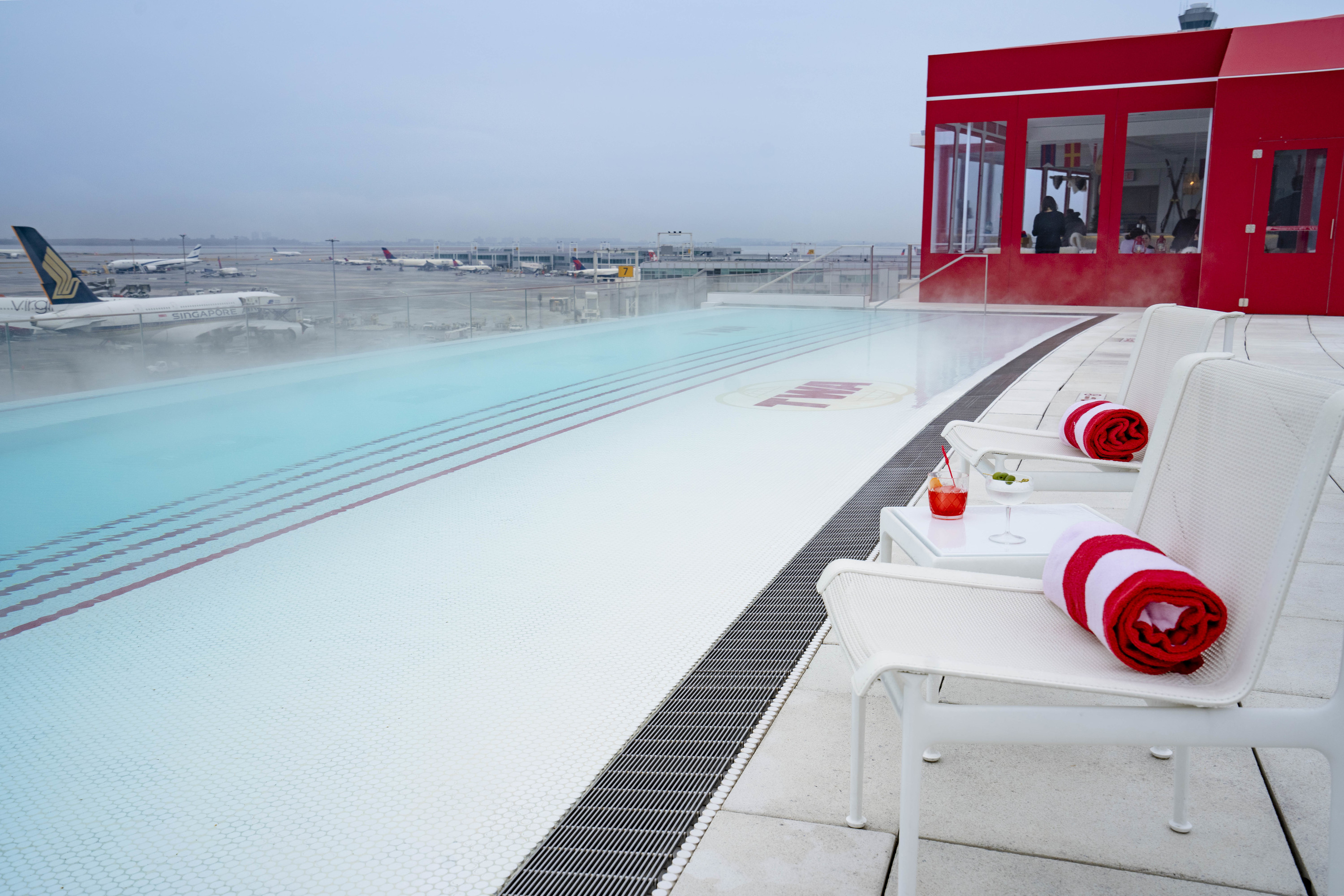 This massive rooftop hot tub will be overlooking the runway at JFK all winter