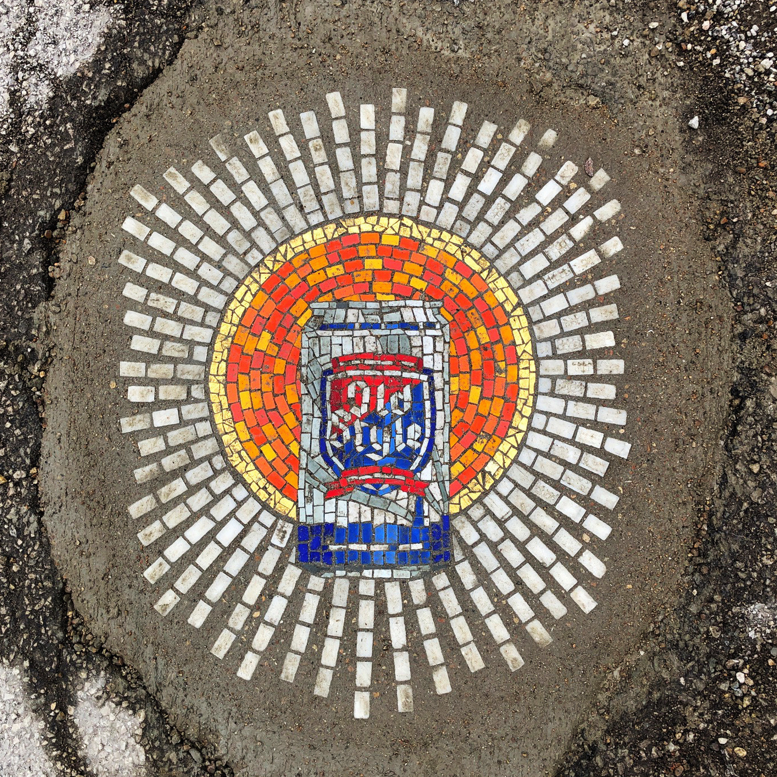This Chicago artist is filling potholes with stunning mosaics of toilet