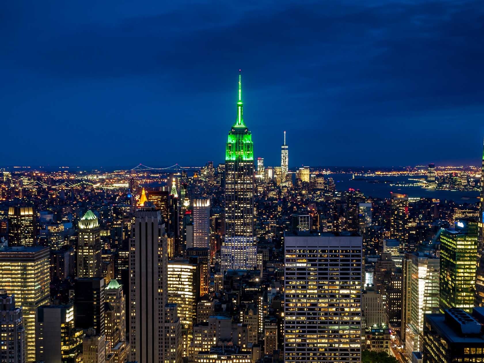 NYC landmarks will light up green to honor essential workers in the