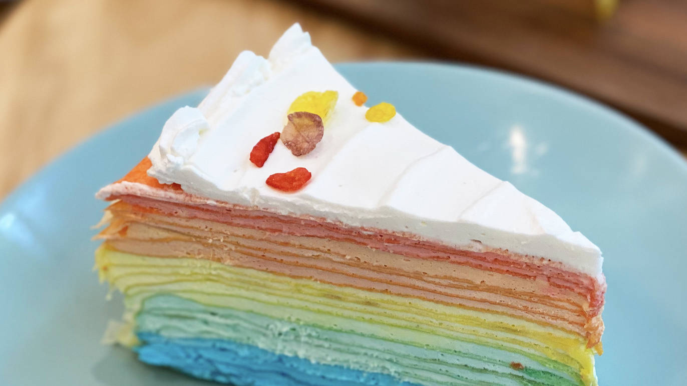 Treat yourself to a delicious, colorful rainbow crepe cake from this