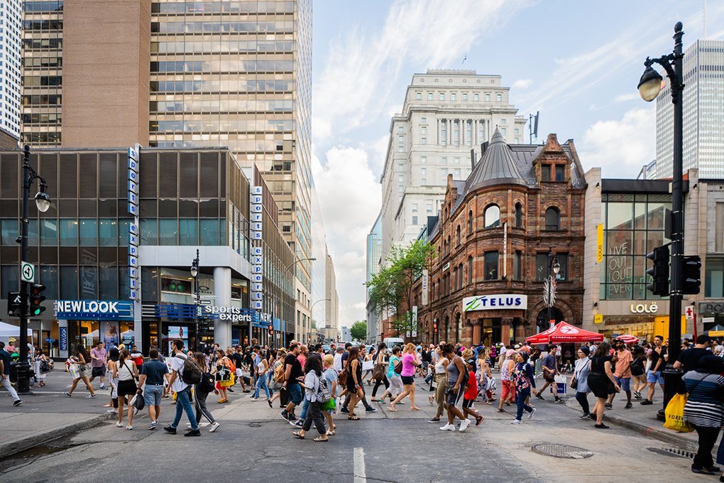 Downtown Montreal to a giant openair sidewalk sale and street