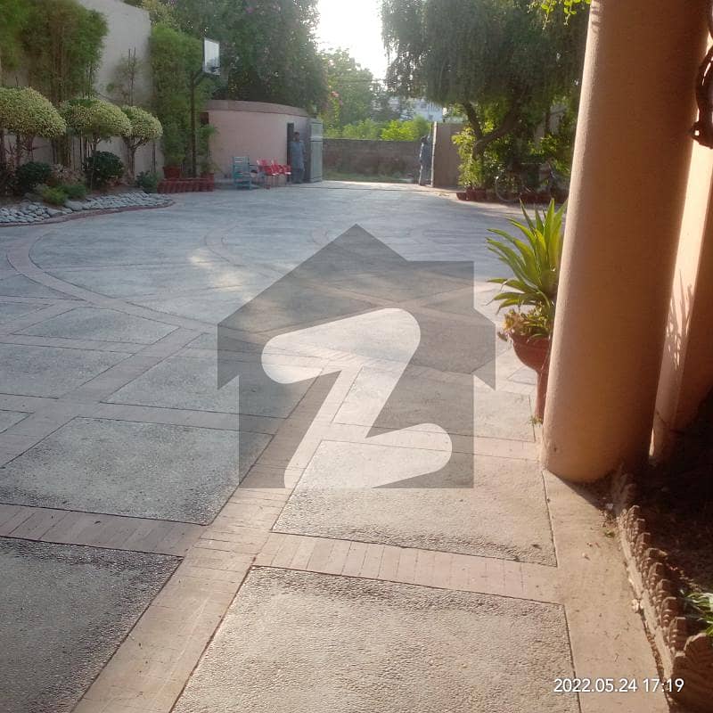 Facing Canal Road One Kanal Double Storey House With Marble Flooring For Rent In Muslim Town