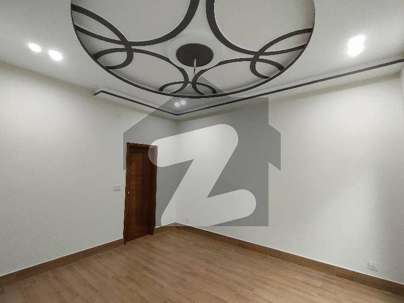 10 Marla Facing Park House Available For Rent in Wapda Town phase 2