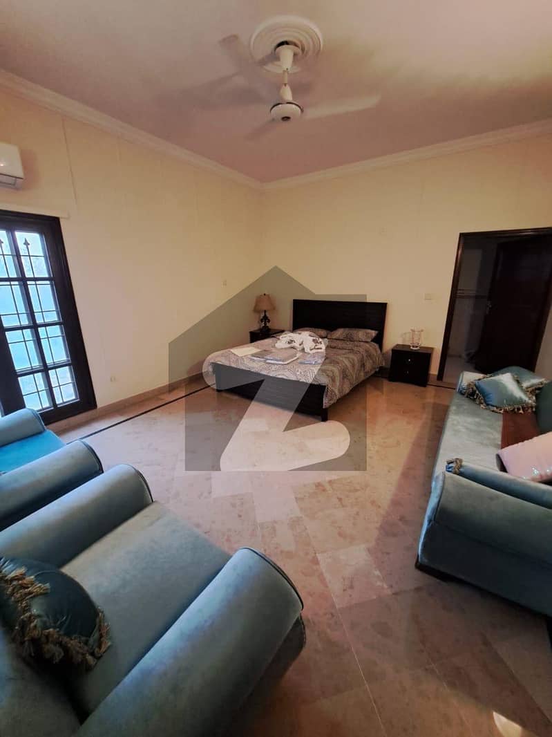 Offering 1000 Sq. Yds Fully Furnished Luxury House With Huge Lawn For
