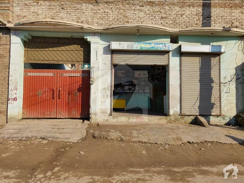 10 Marla Single Storey House With 2 Shops Is Available For Sale In