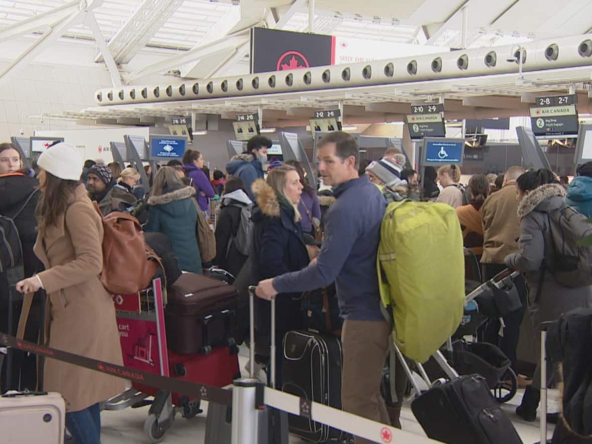 At Toronto's main airport, stranded travellers are still waiting for