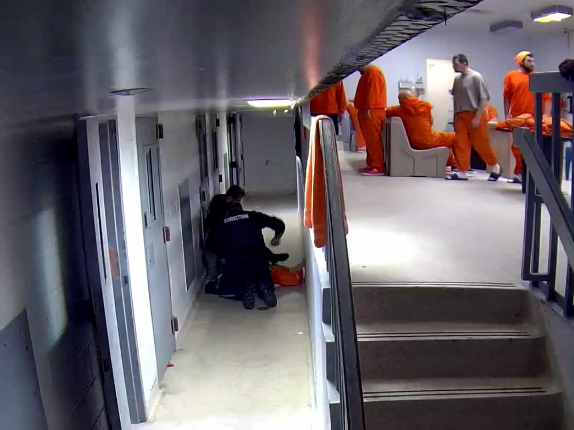 Videos showing jail guards punching inmate played in court after failed