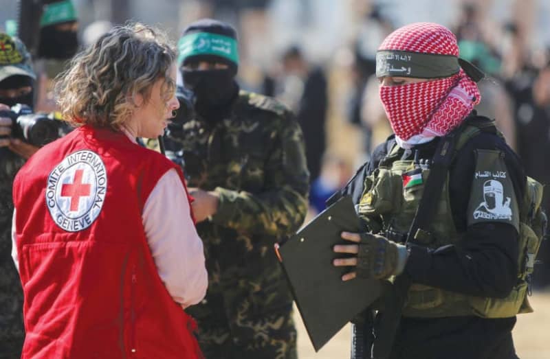 Hamas tells Red Cross that release of hostages will begin at 8:00 a.m.